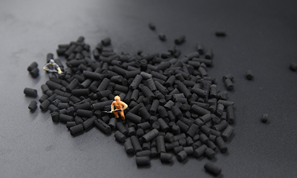 MgO extruded activated carbon