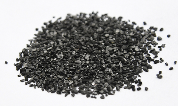 Impregnated activated carbon pellet